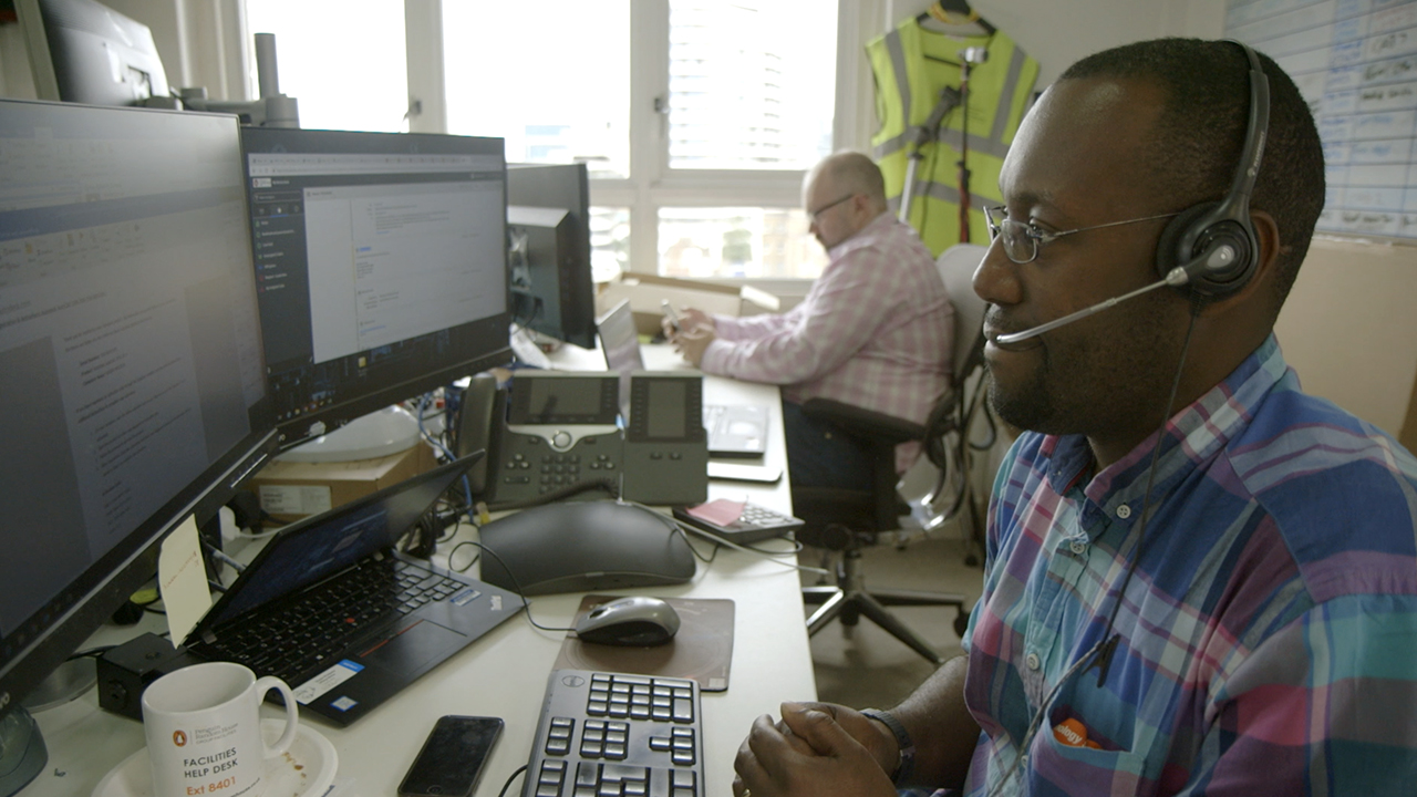 Member of technology team on the phone